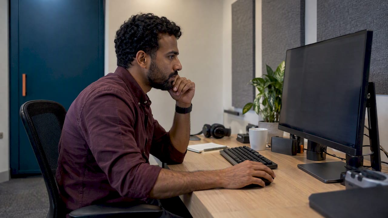 Engineer reviewing EBS volume capacity at workstation